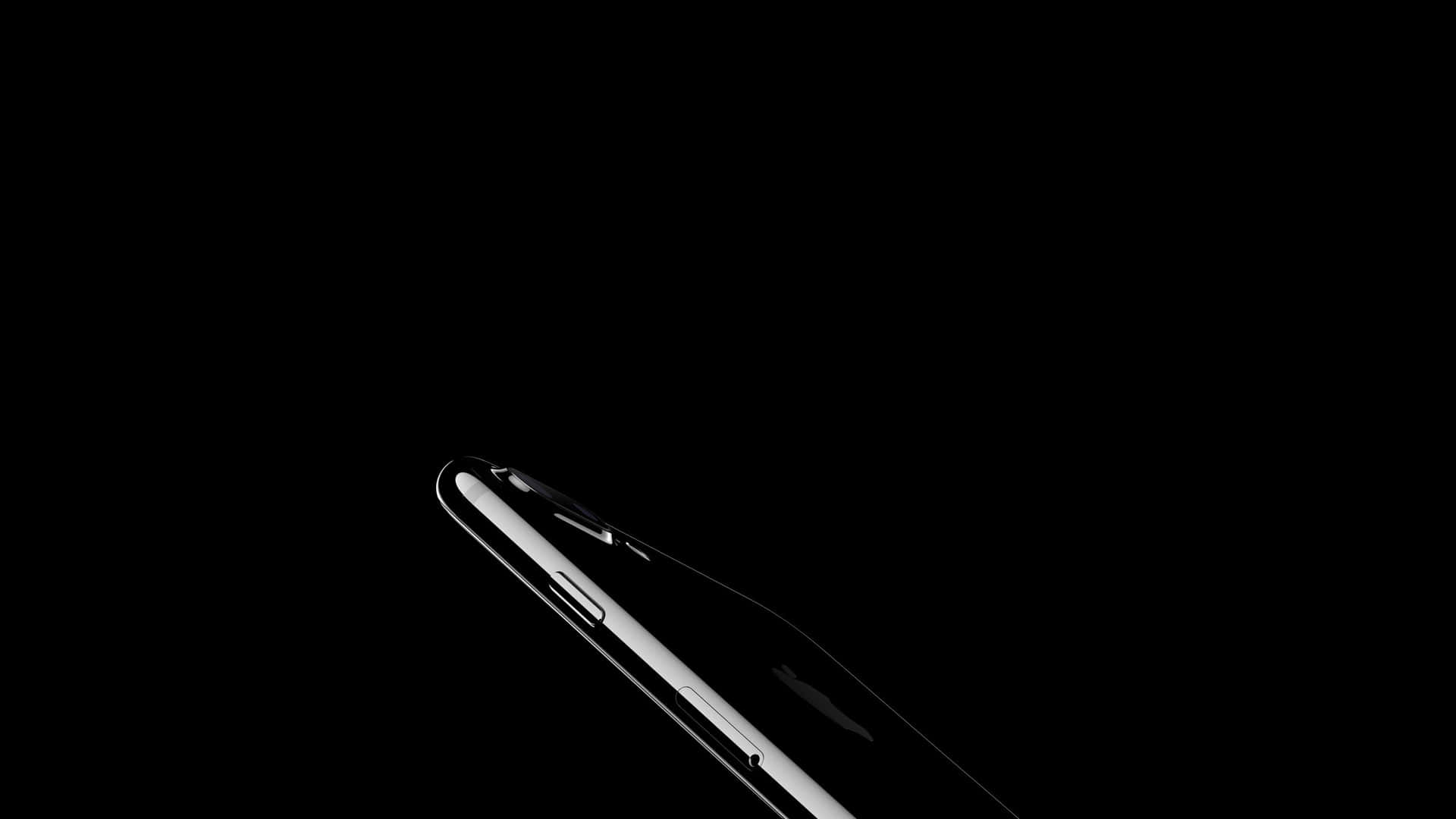 An Iphone Is Shown In A Black Background Wallpaper