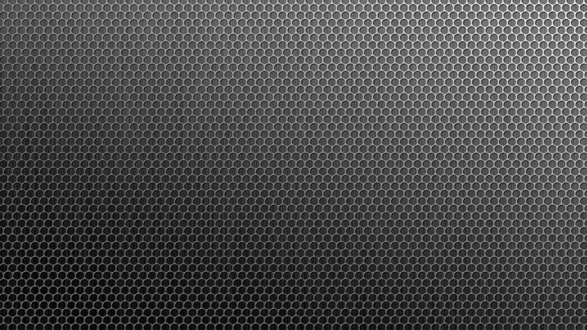 A Black Background With A Pattern Of Hexagons Wallpaper