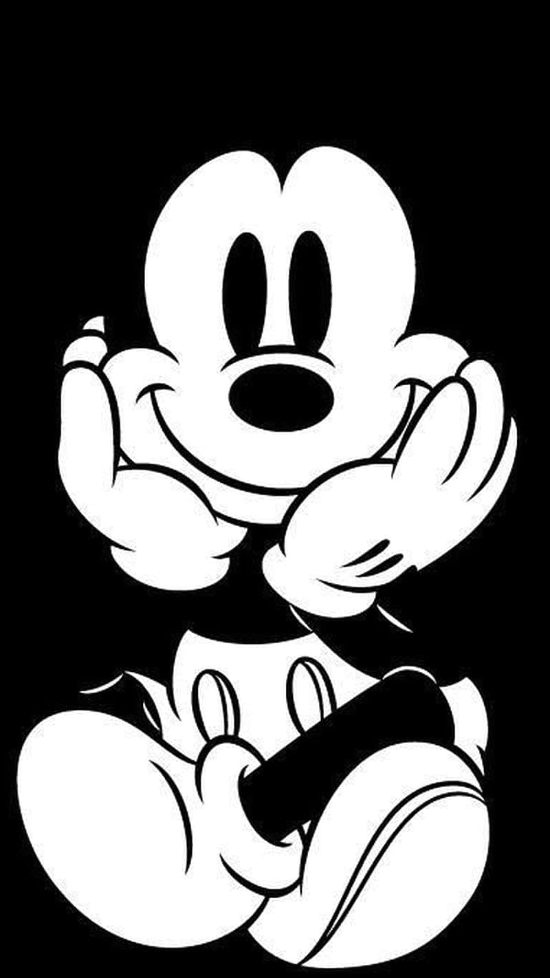 Et sort og hvidt billede af en Mickey Mouse-silhuet. Wallpaper
