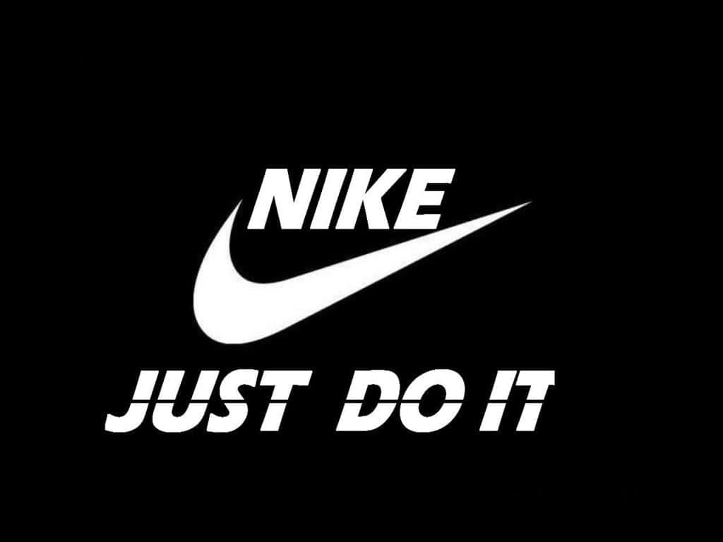Nike Just Do It Logo On A Black Background Wallpaper