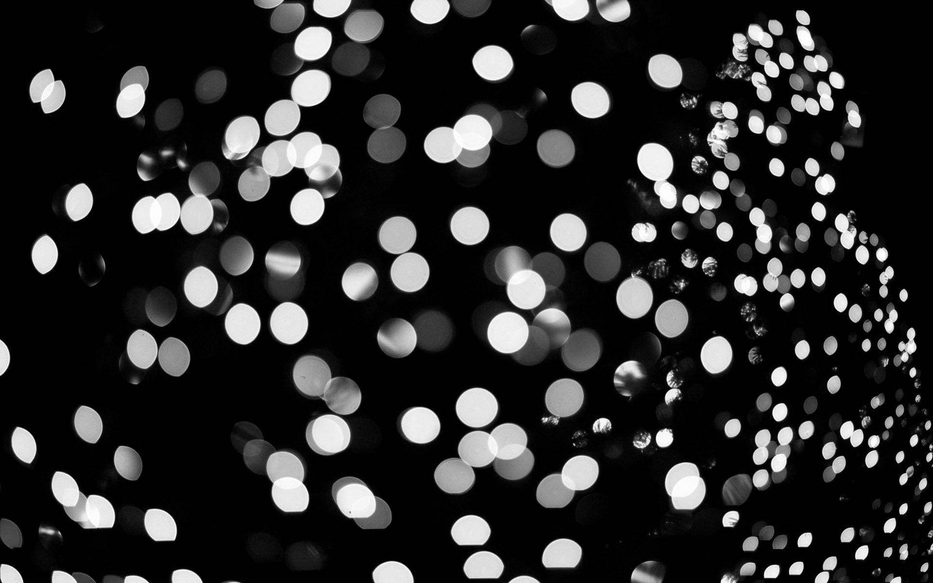 Unafoto En Blanco Y Negro De Una Calle Con Luces Fondo de pantalla