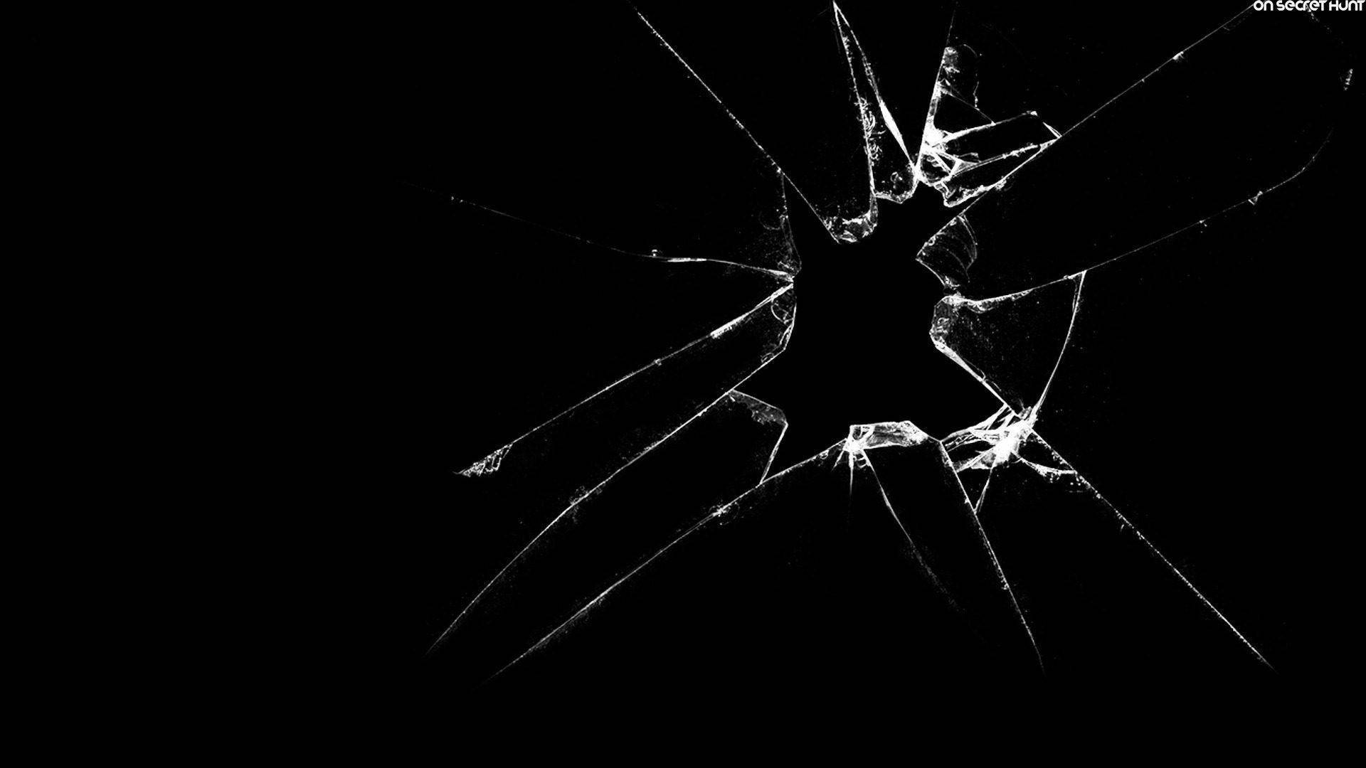 A Black And White Image Of A Broken Glass Wallpaper