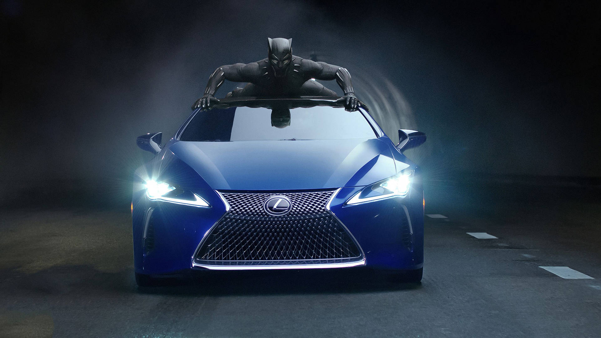 Striking Blue Lexus Underneath the Shadow of the Black Panther Wallpaper