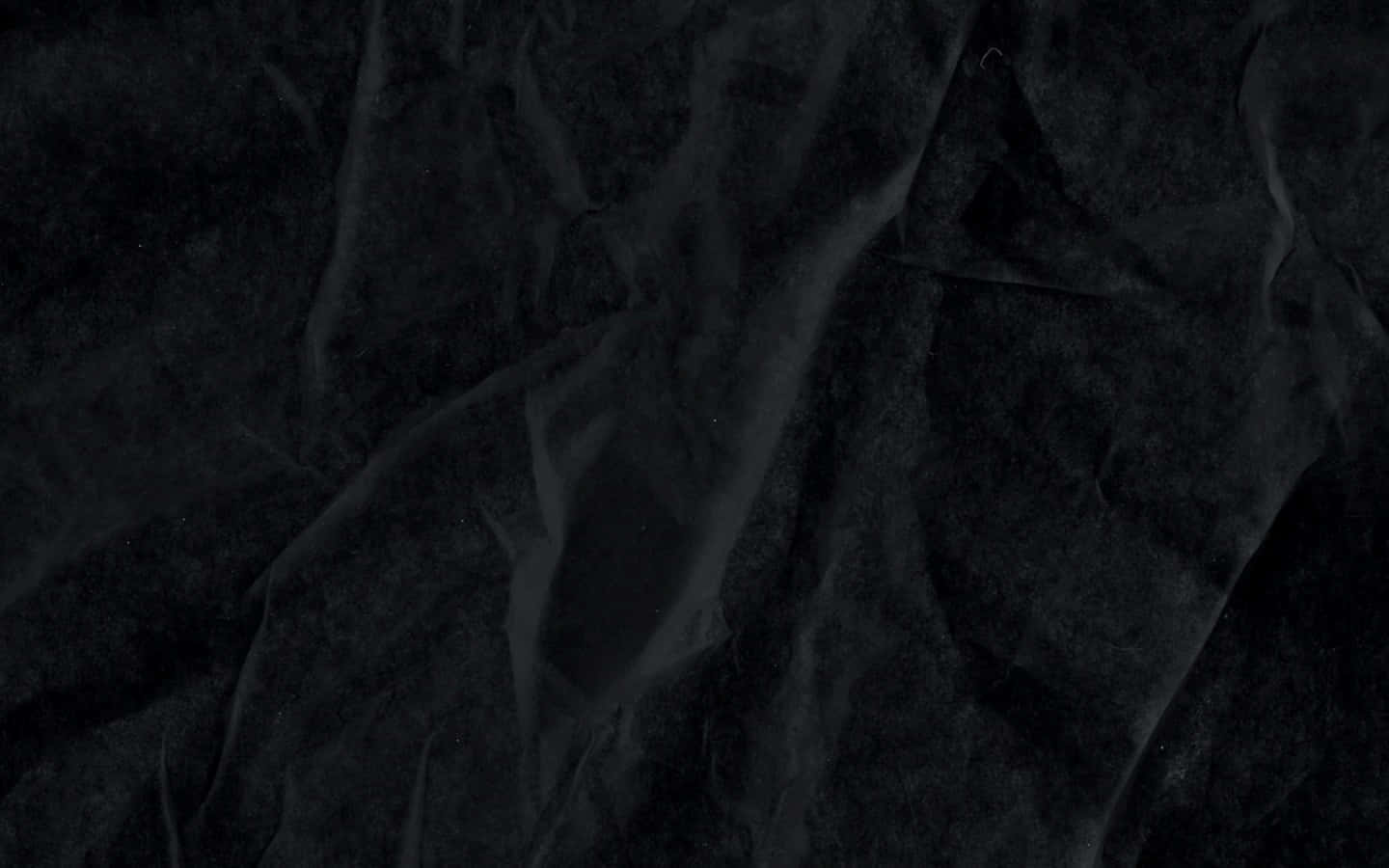 Black Paper Texture With A Black Background