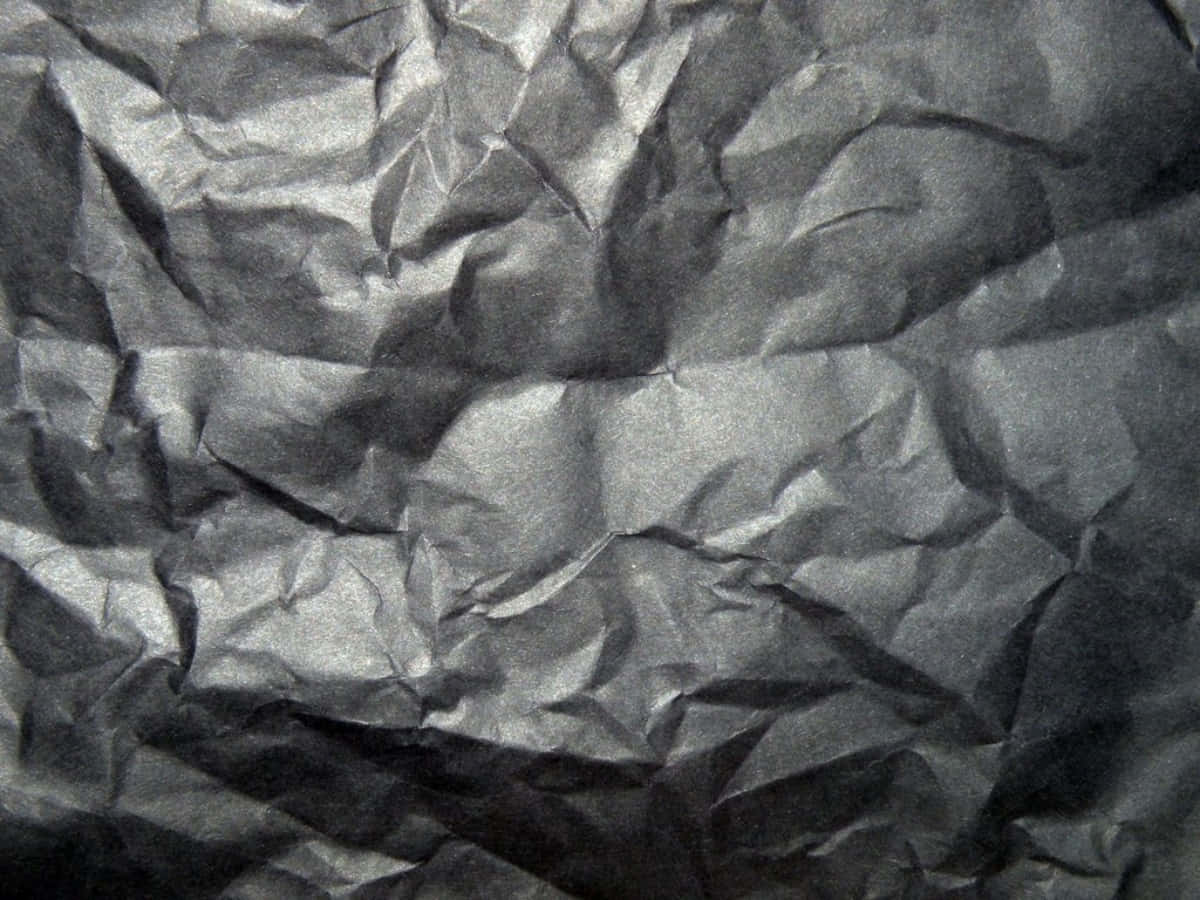 A Close Up Of A Crumpled Piece Of Paper