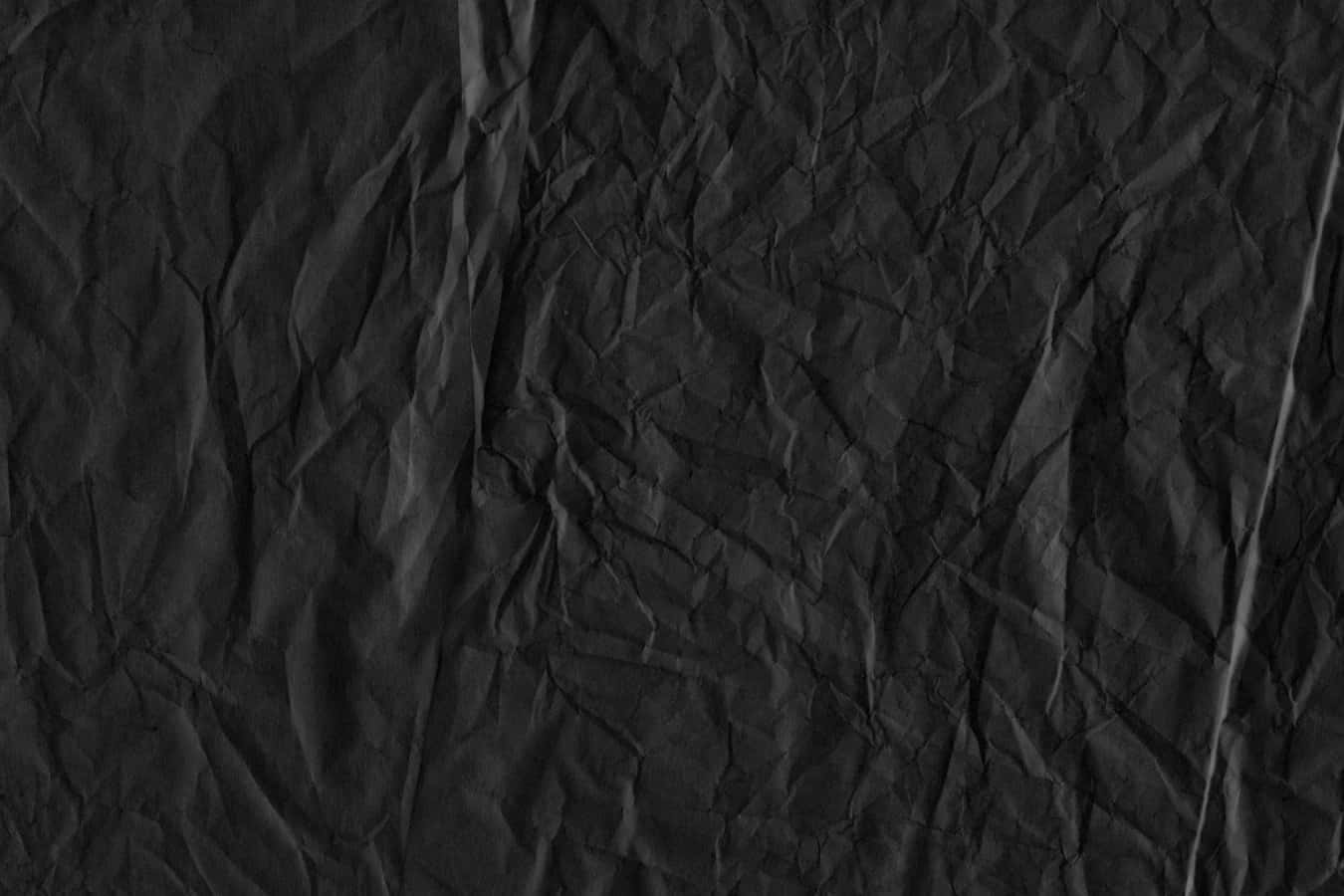 Black paper texture with intricate patterns
