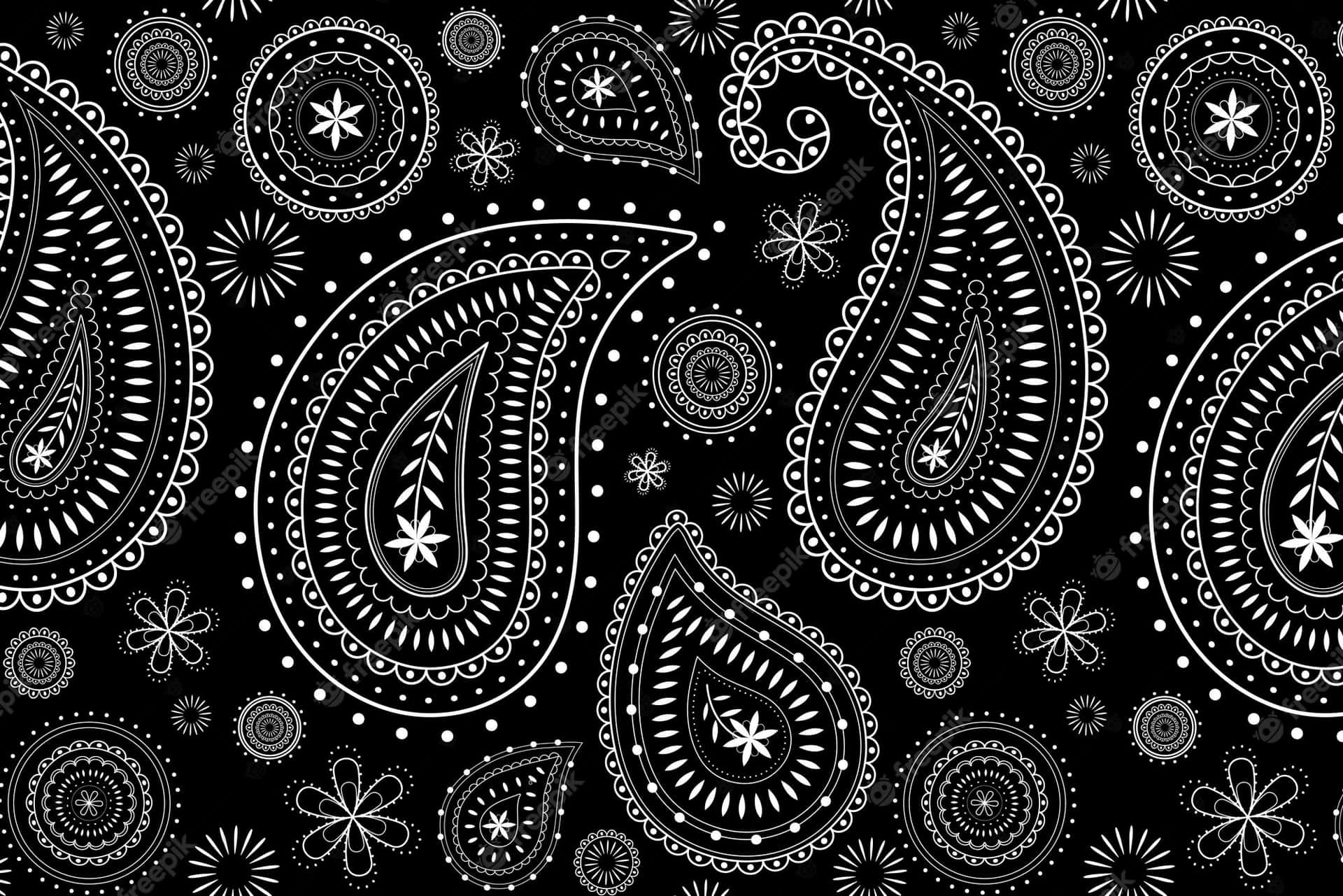 A White Paisley Pattern On A Black Background