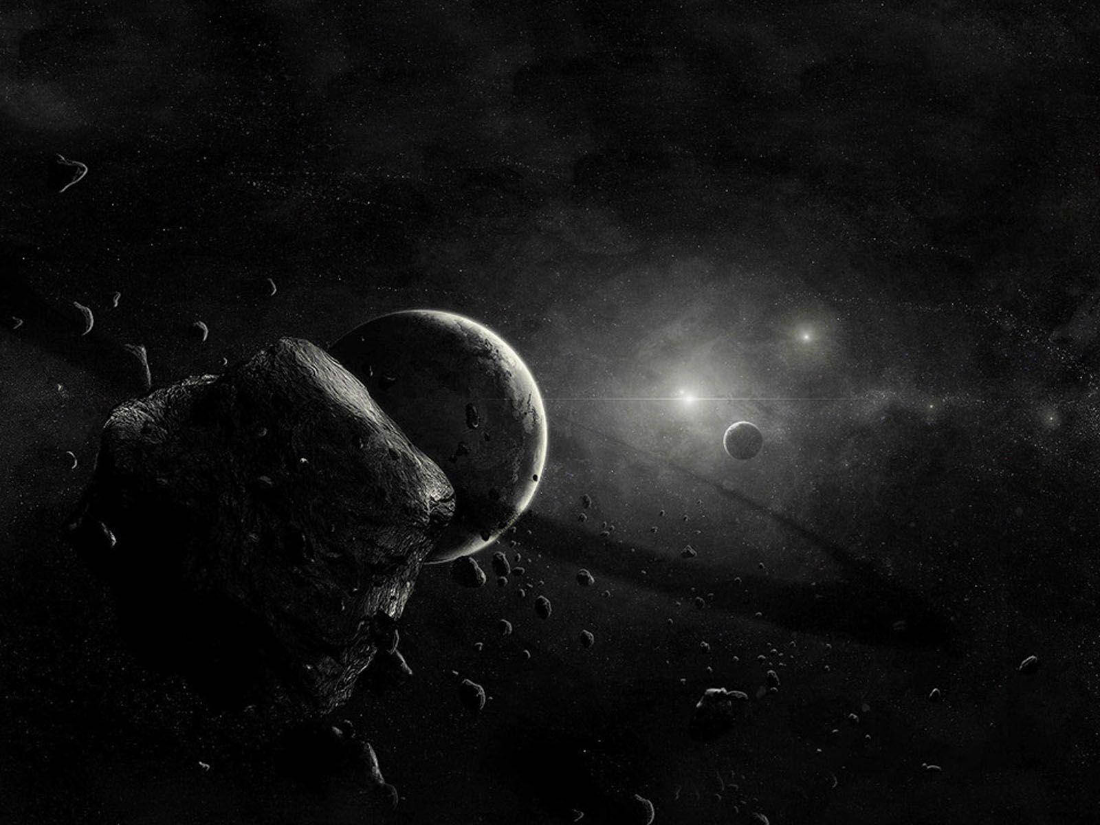 Black Planet Behind Asteroid Wallpaper