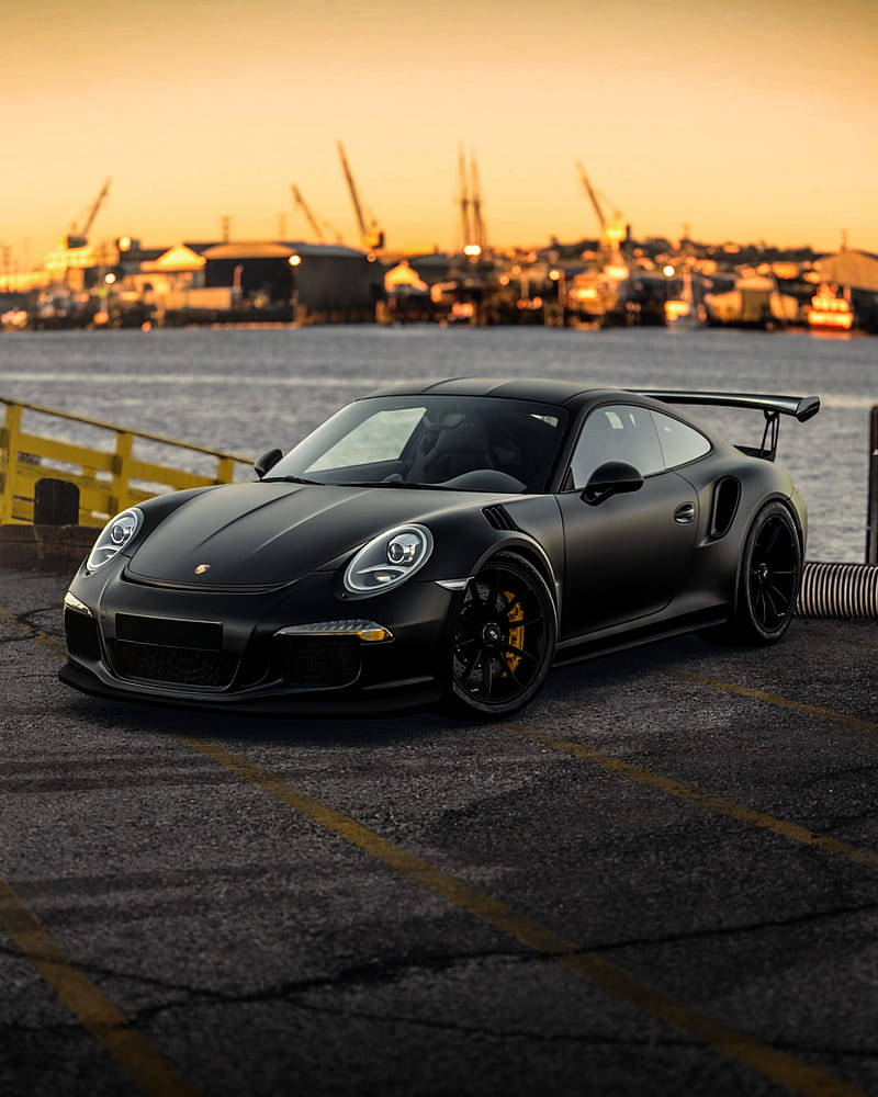 Black Porsche 911 By The Sea Wallpaper