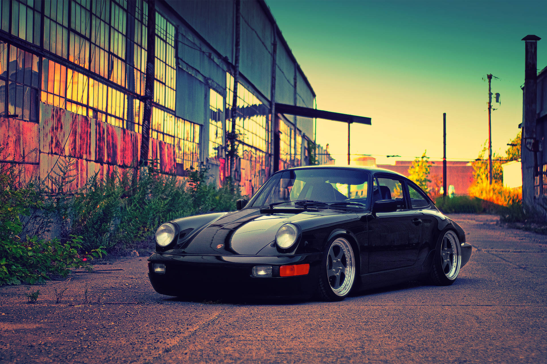 Black Porsche 964 In Sunset Wallpaper