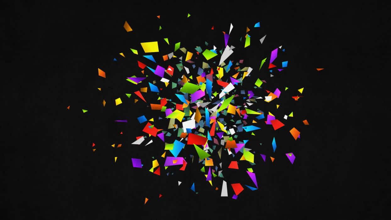 A Colorful Explosion Of Confetti On A Black Background Wallpaper