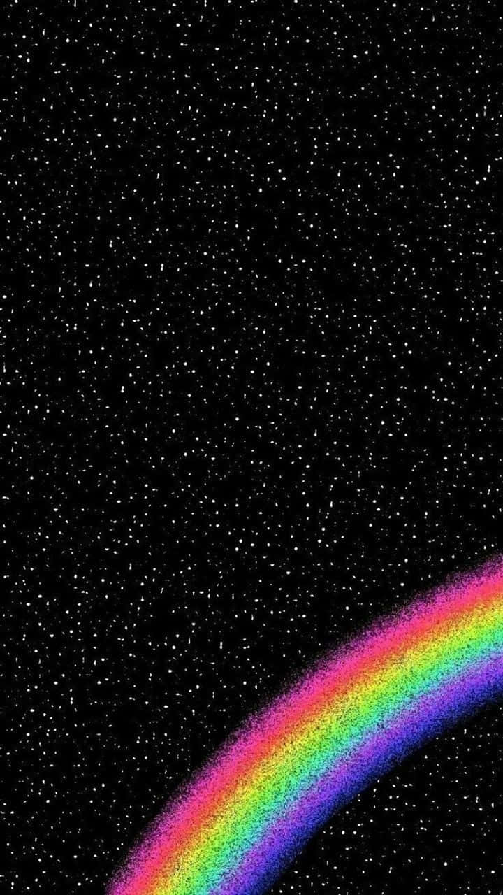 Et smukt sort regnbue, der strækker sig over himlen. Wallpaper