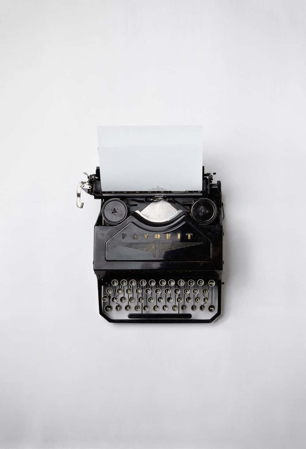 Máquinade Escribir Retro En Color Negro. Fondo de pantalla