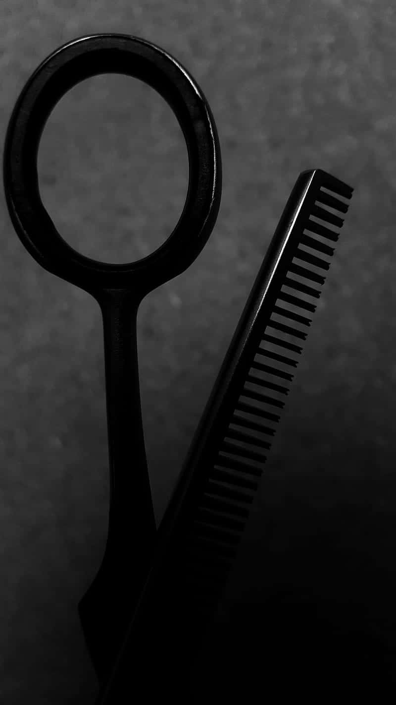 Black Scissor With Comb Used For Cutting Wallpaper