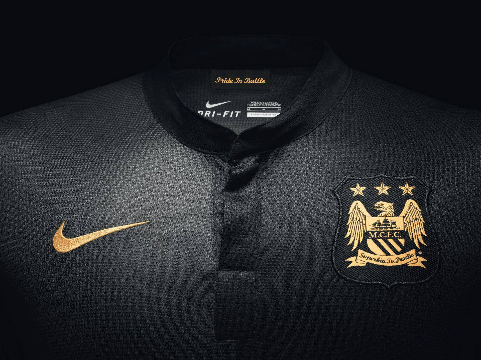 Black Shirt With Manchester City Fc Logo Wallpaper