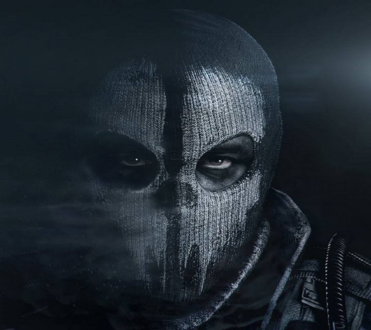 A Man In A Mask Is Standing In The Dark Wallpaper
