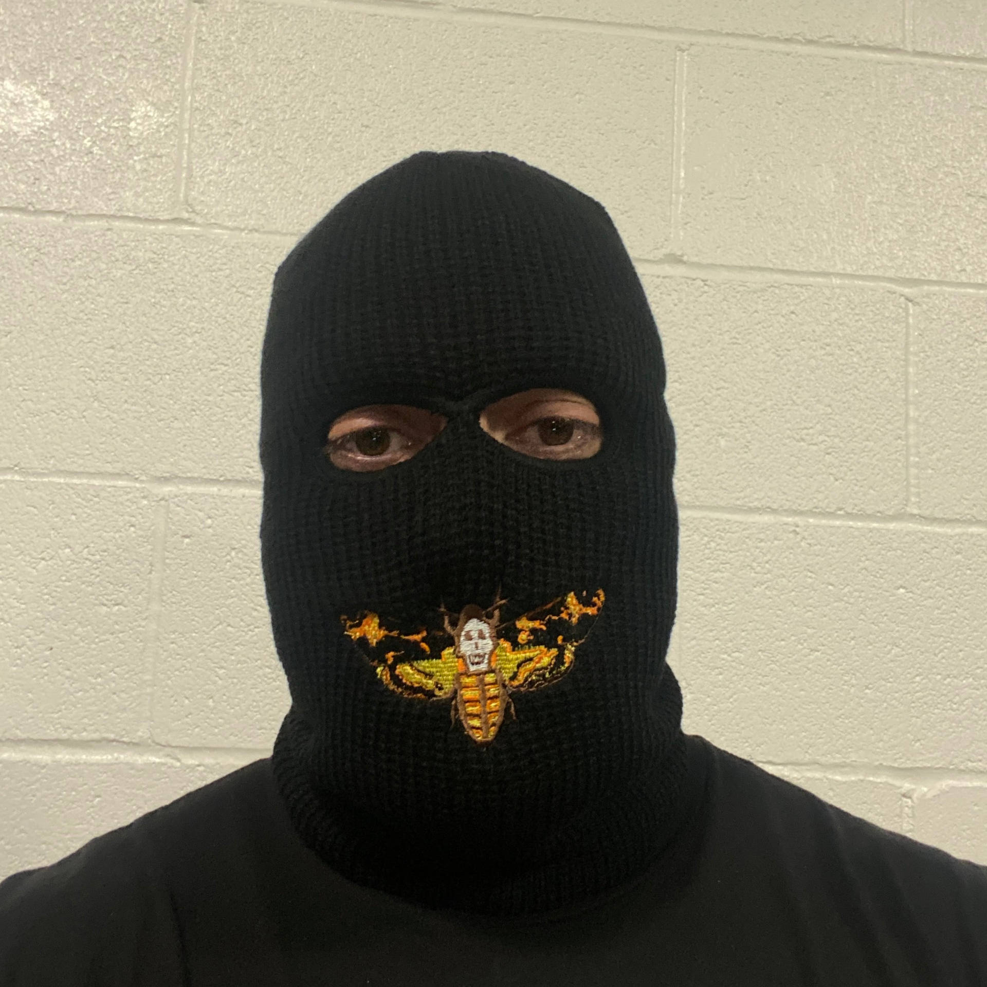 Black Ski Mask With Butterfly Mouth Wallpaper