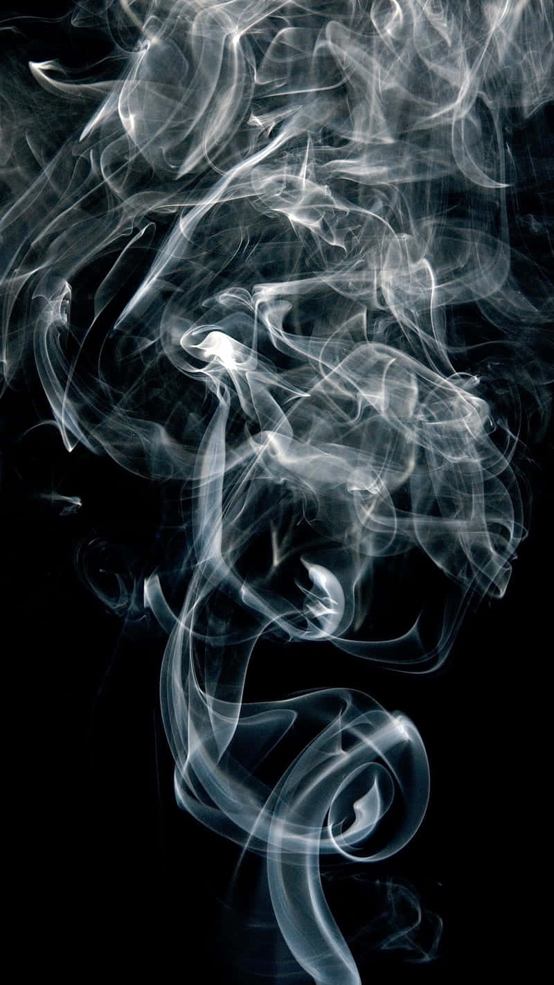 Black Smoke Rising in a Fiery Scene Wallpaper