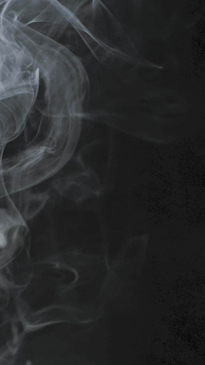 Wispy Smoke Curling Into The Darkness Wallpaper