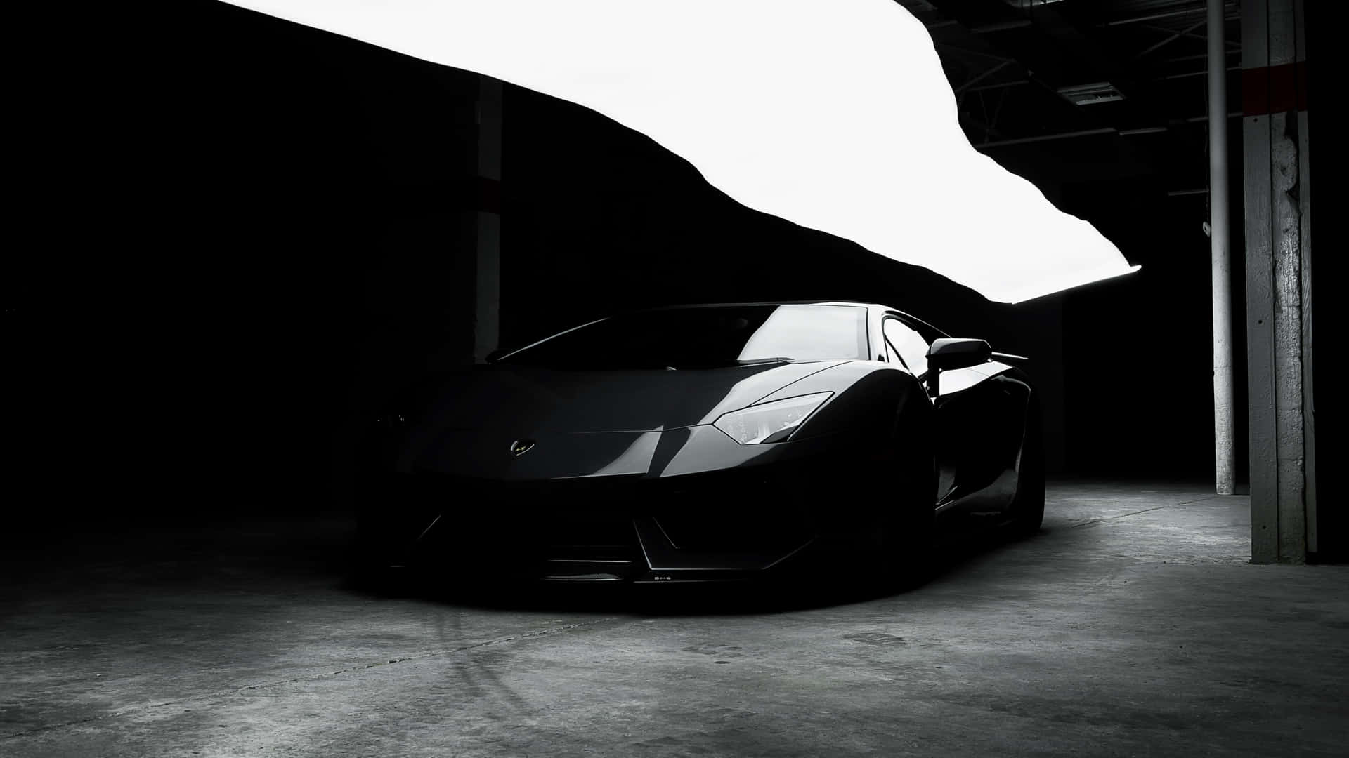 Black Sports Carin Shadowy Garage.jpg Wallpaper