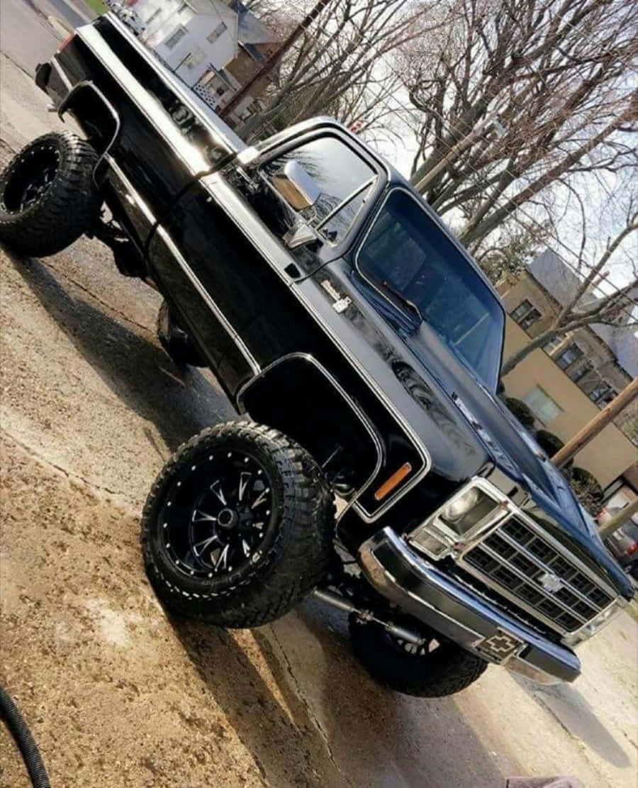 Black Square Body Truck On Street Wallpaper