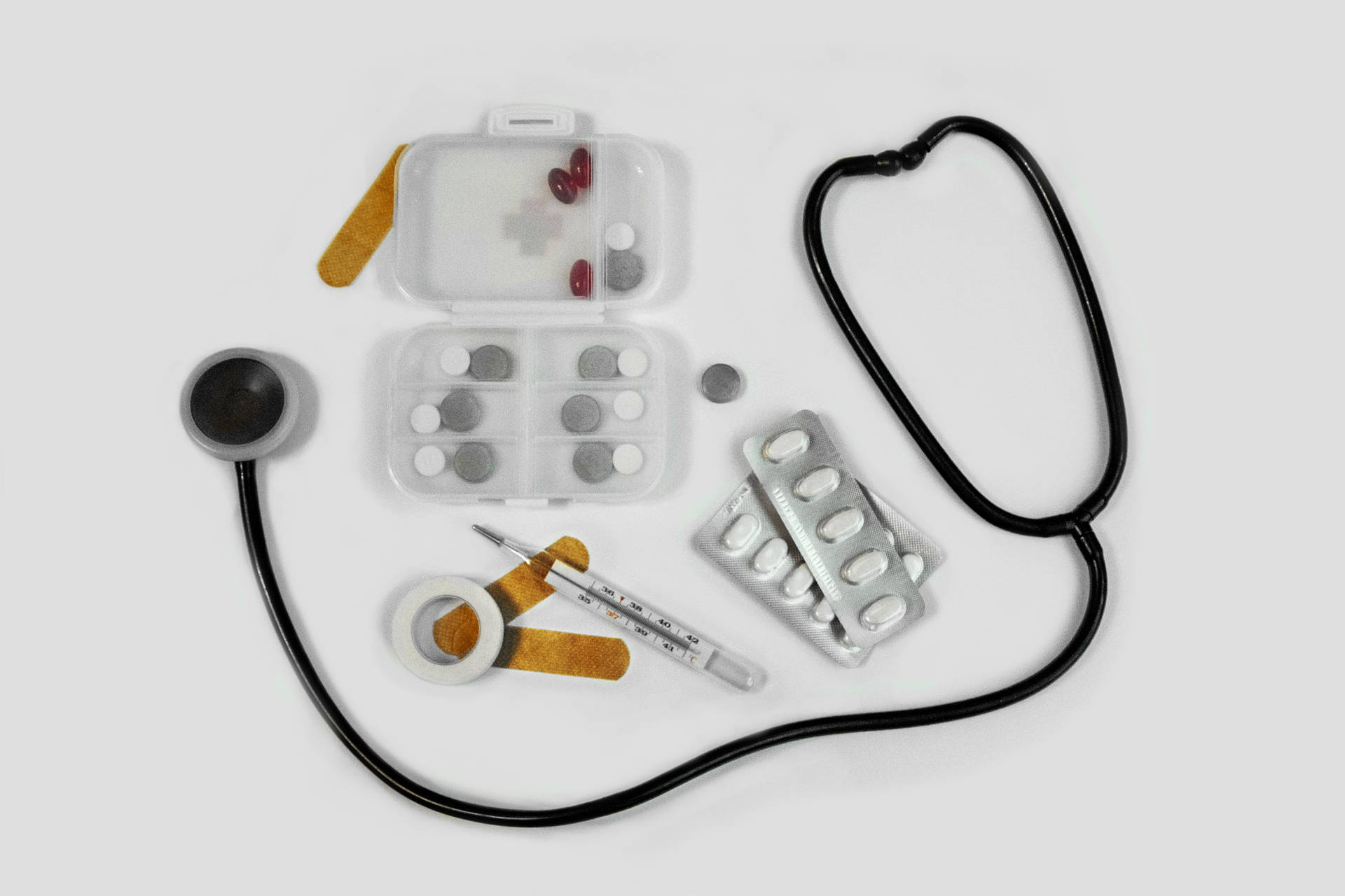 Black Stethoscope And Medicines Wallpaper