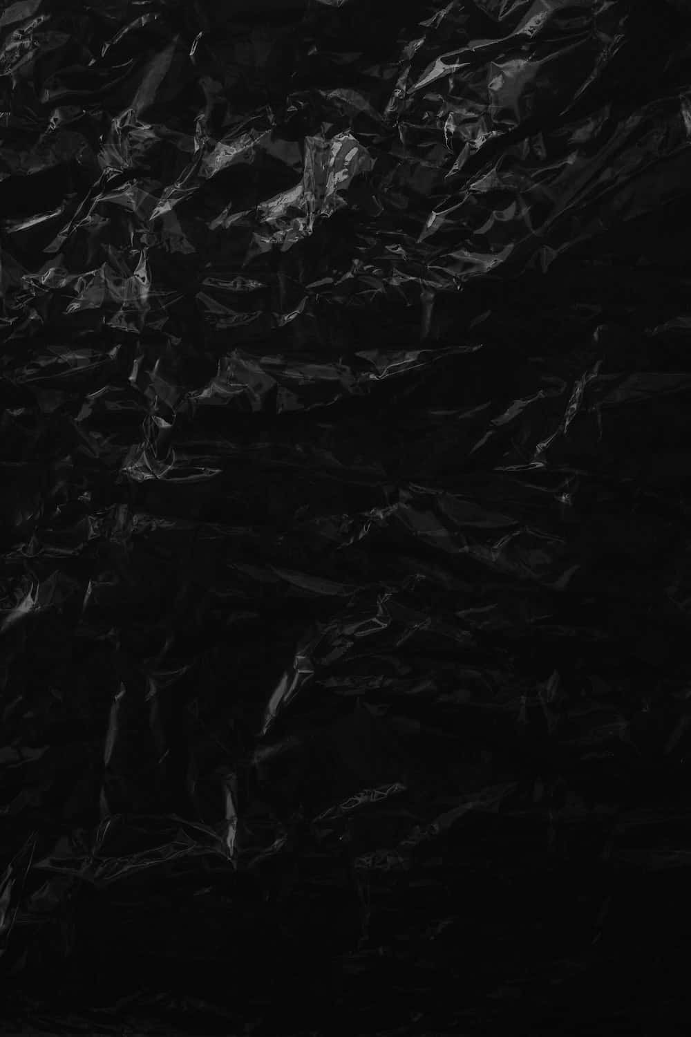 Plastisk sort tekstur billeder
