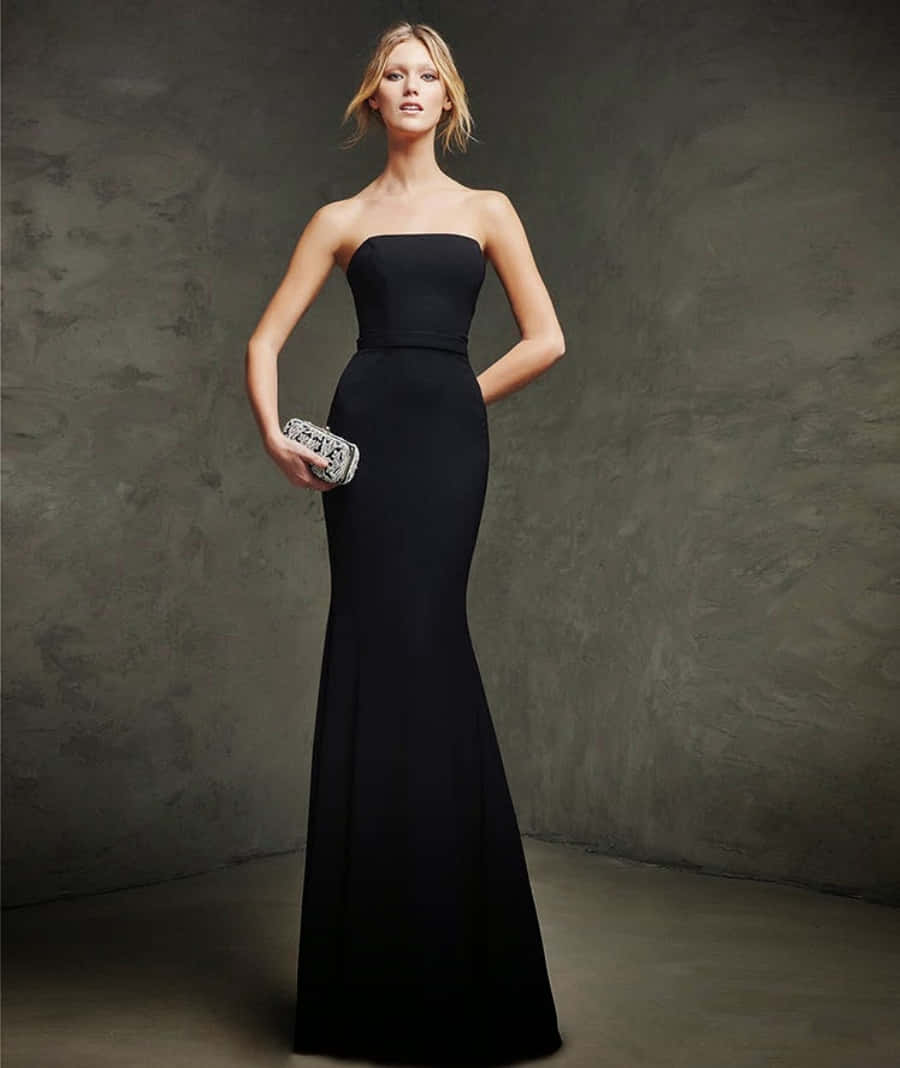 Feel glamorous in this strapless black tie dress. Wallpaper