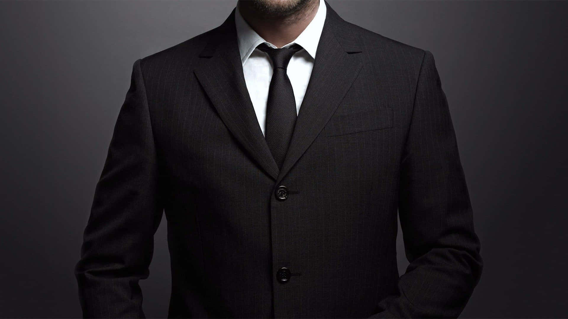 Black Tie With A Black Men Suit Wallpaper