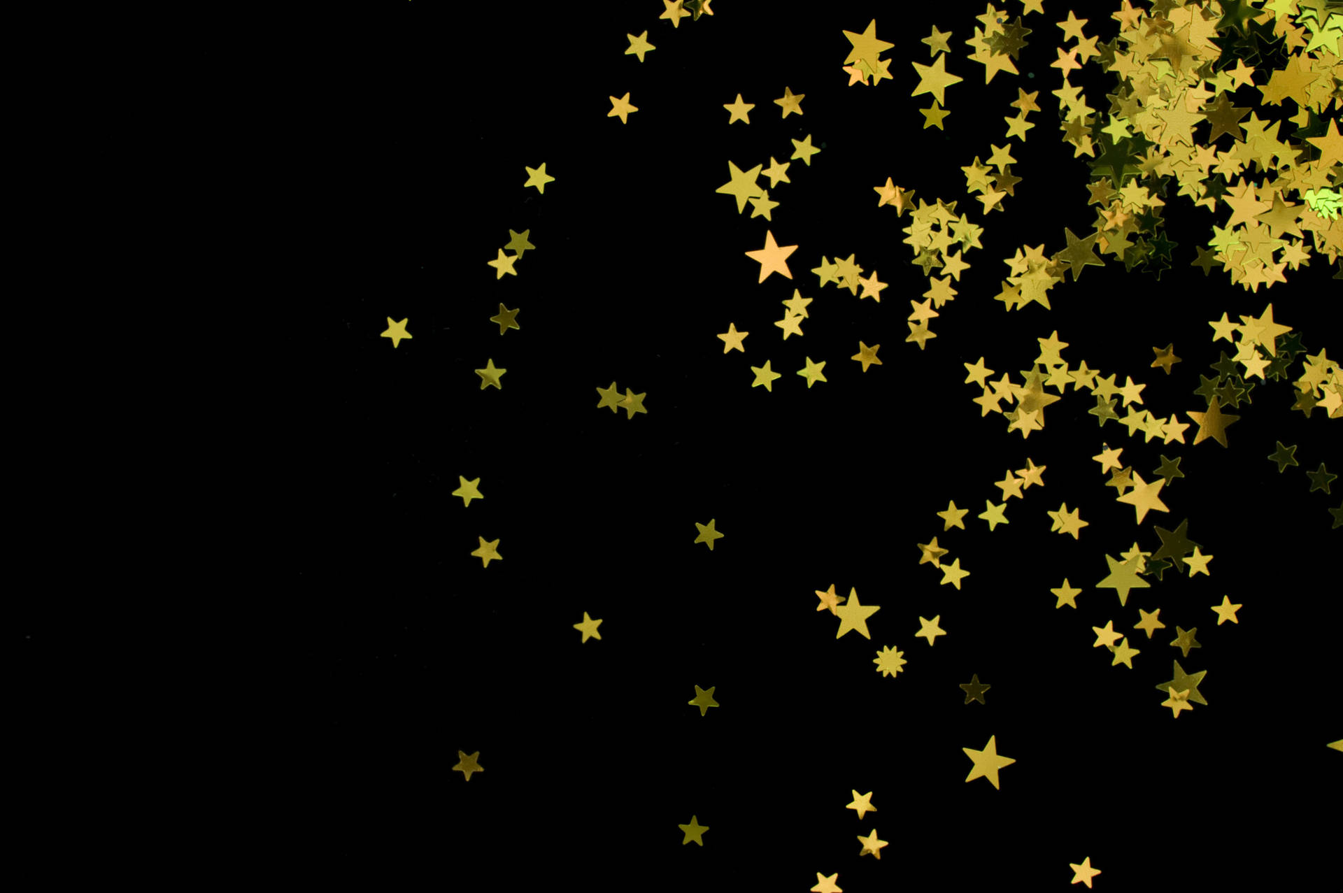 Negrocon Estrellas Brillantes Doradas. Fondo de pantalla