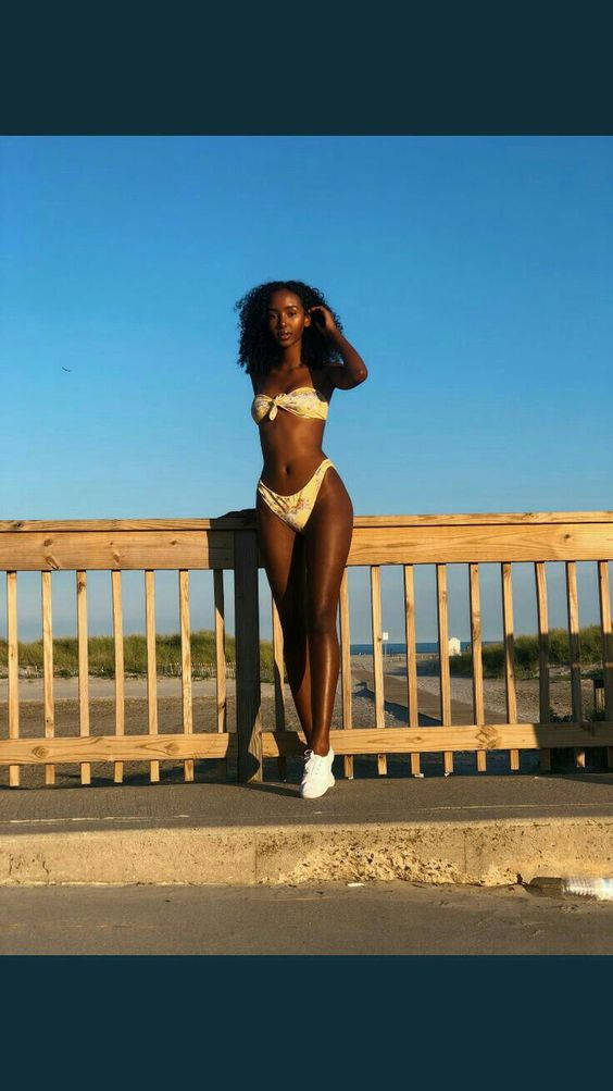 Black Woman In Bikini Railings Wallpaper