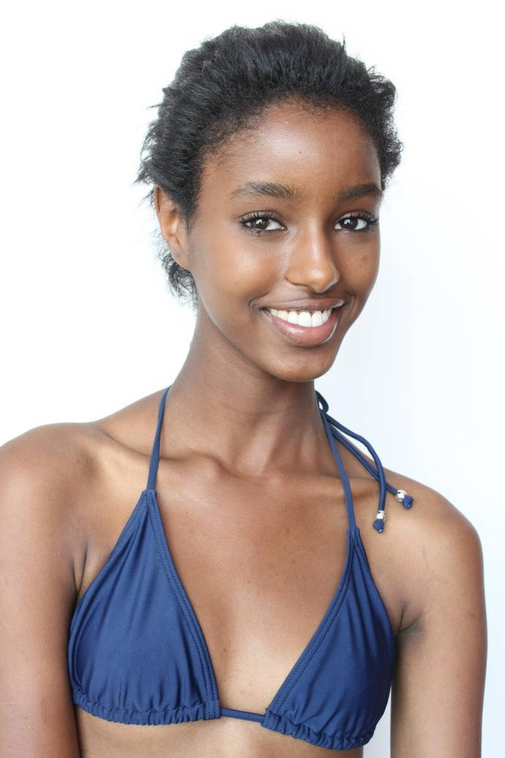 Black Woman In Bikini Smiling Wallpaper