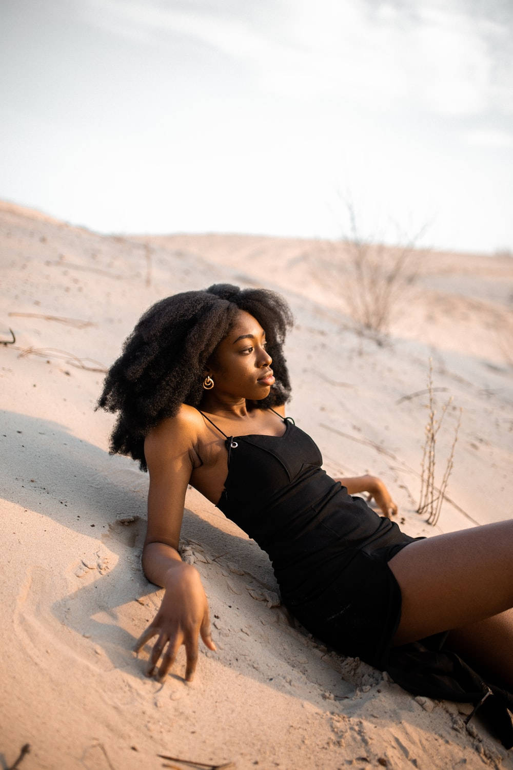Black Woman Model On White Sand Wallpaper