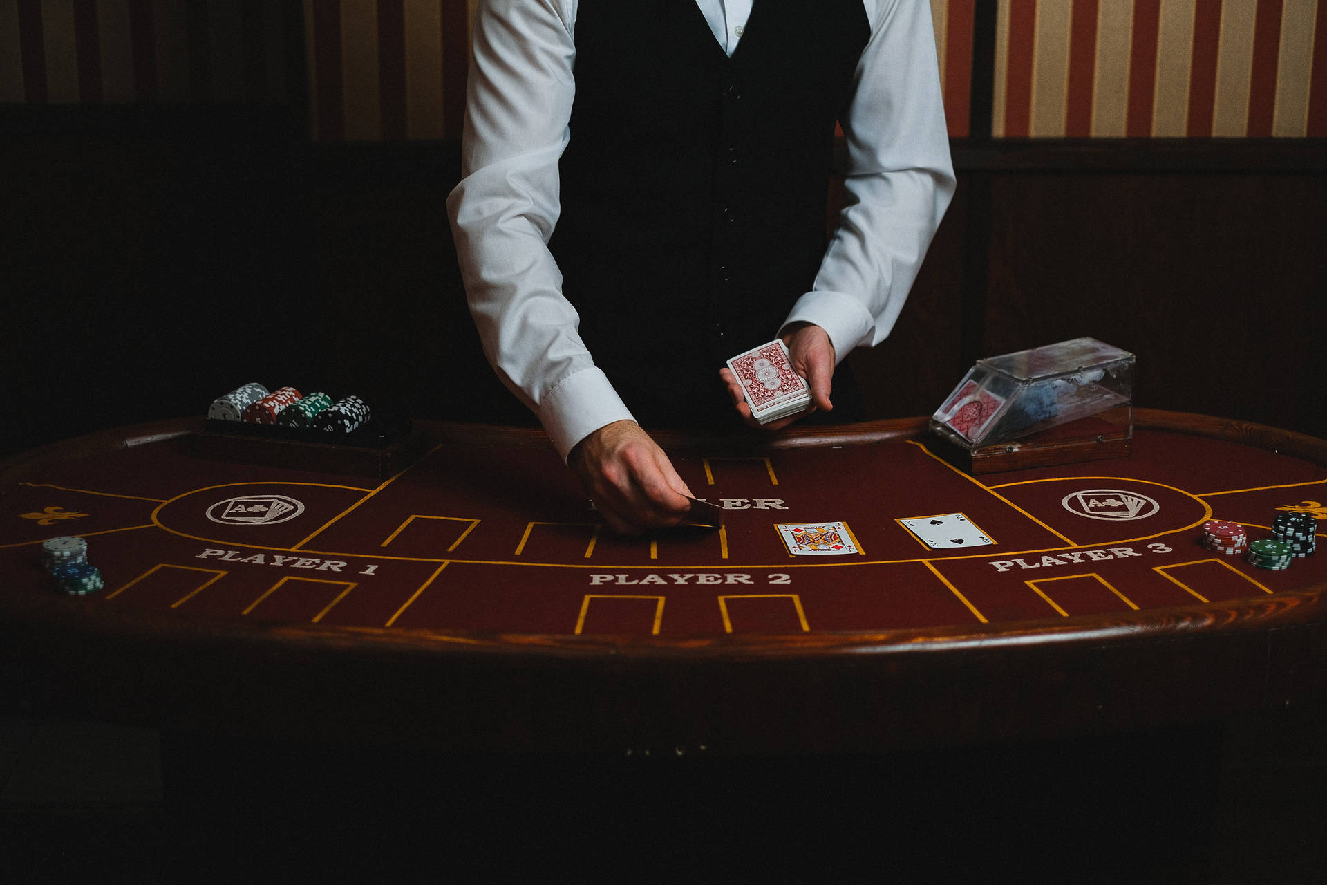 Blackjack Dealer Handling Cards Wallpaper
