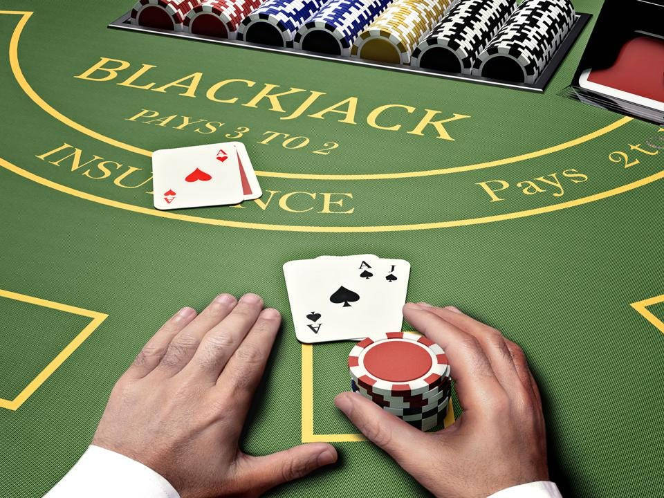 Blackjack Dealer Holding Poker Chips Wallpaper