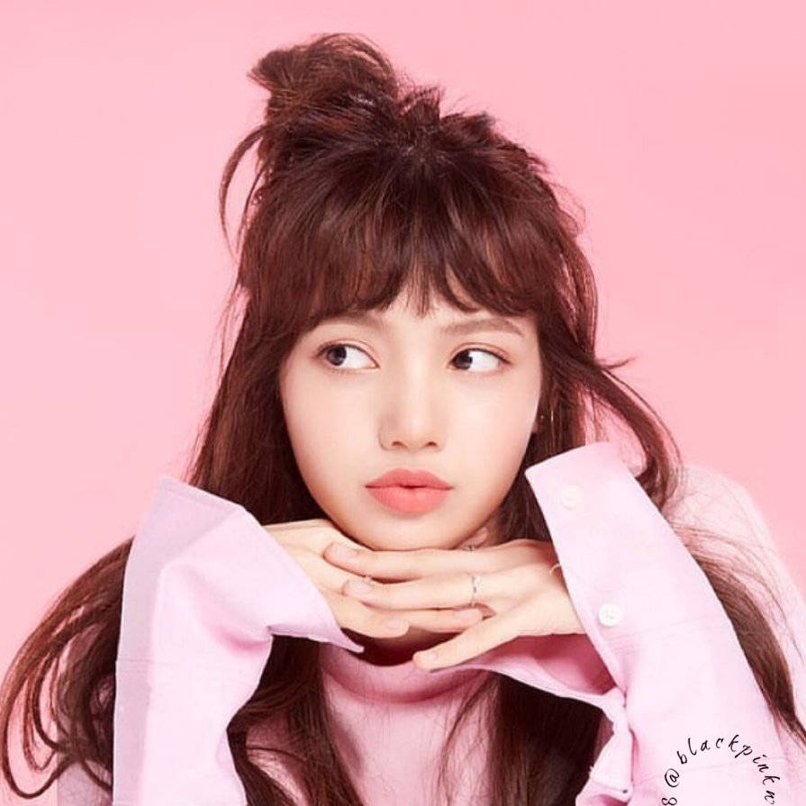 Lisa of Blackpink vibrant and stunning in pink Wallpaper