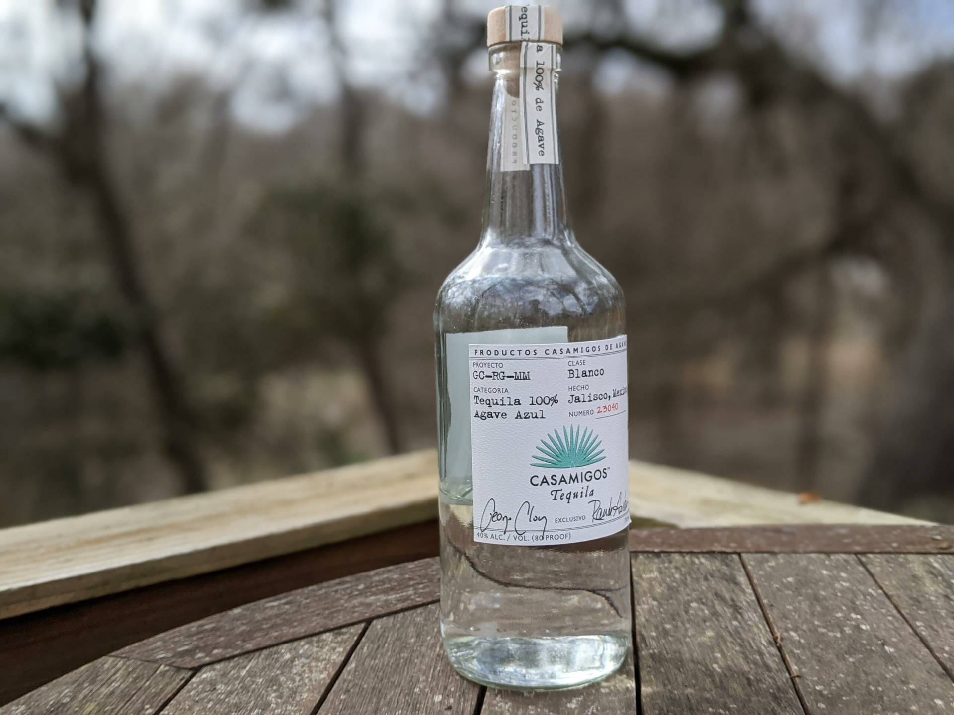 Blanco Casamigos Tequila On Wooden Table Wallpaper