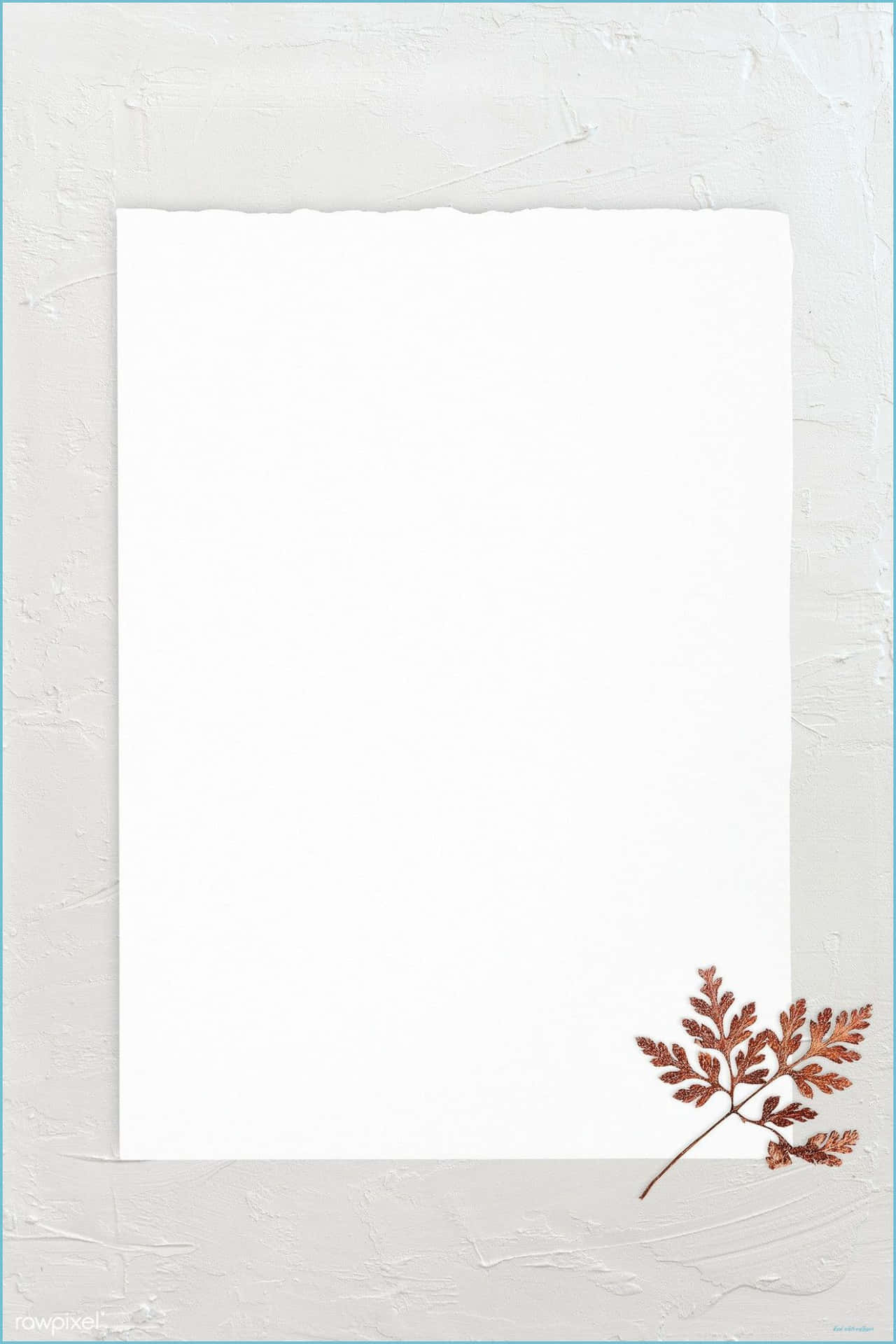 A White Paper With A Leaf On It