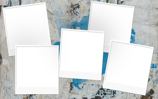 Download Blank Polaroid Frames On Weathered Background | Wallpapers.com