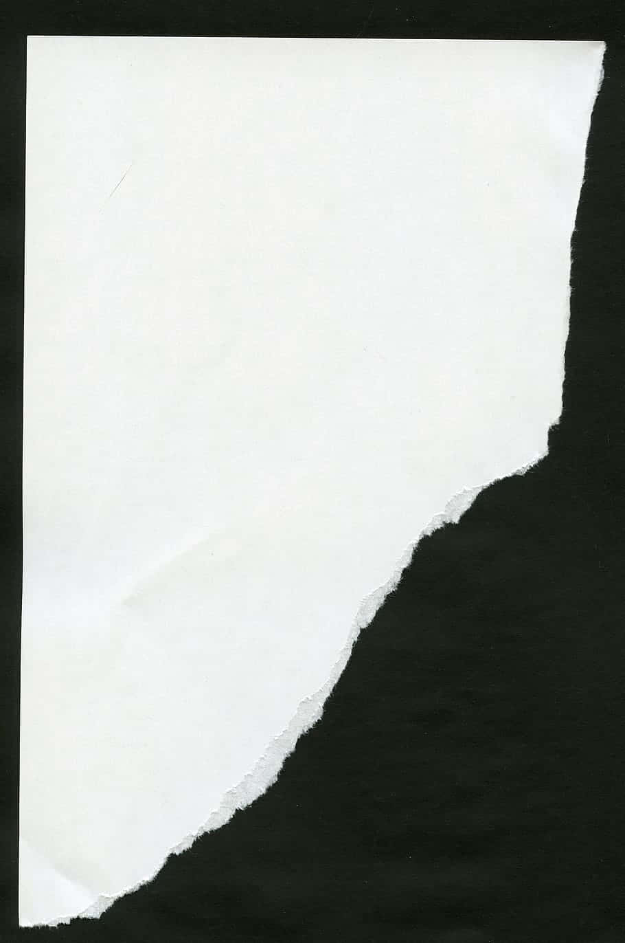 Blank White Torn Paper Black Background Wallpaper