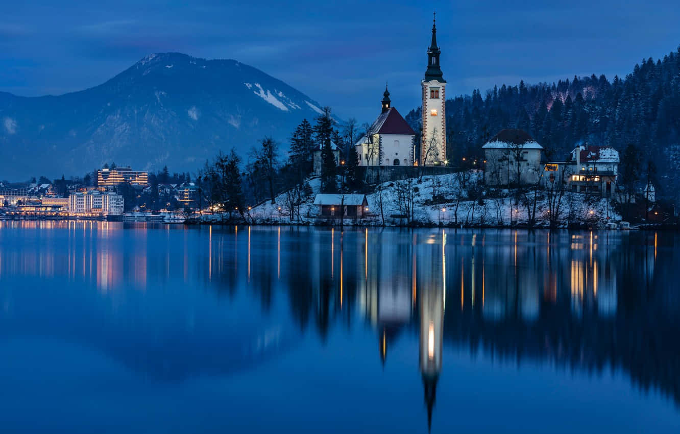 Bled Castle Mirrored In Lake Bled At Dusk Wallpaper