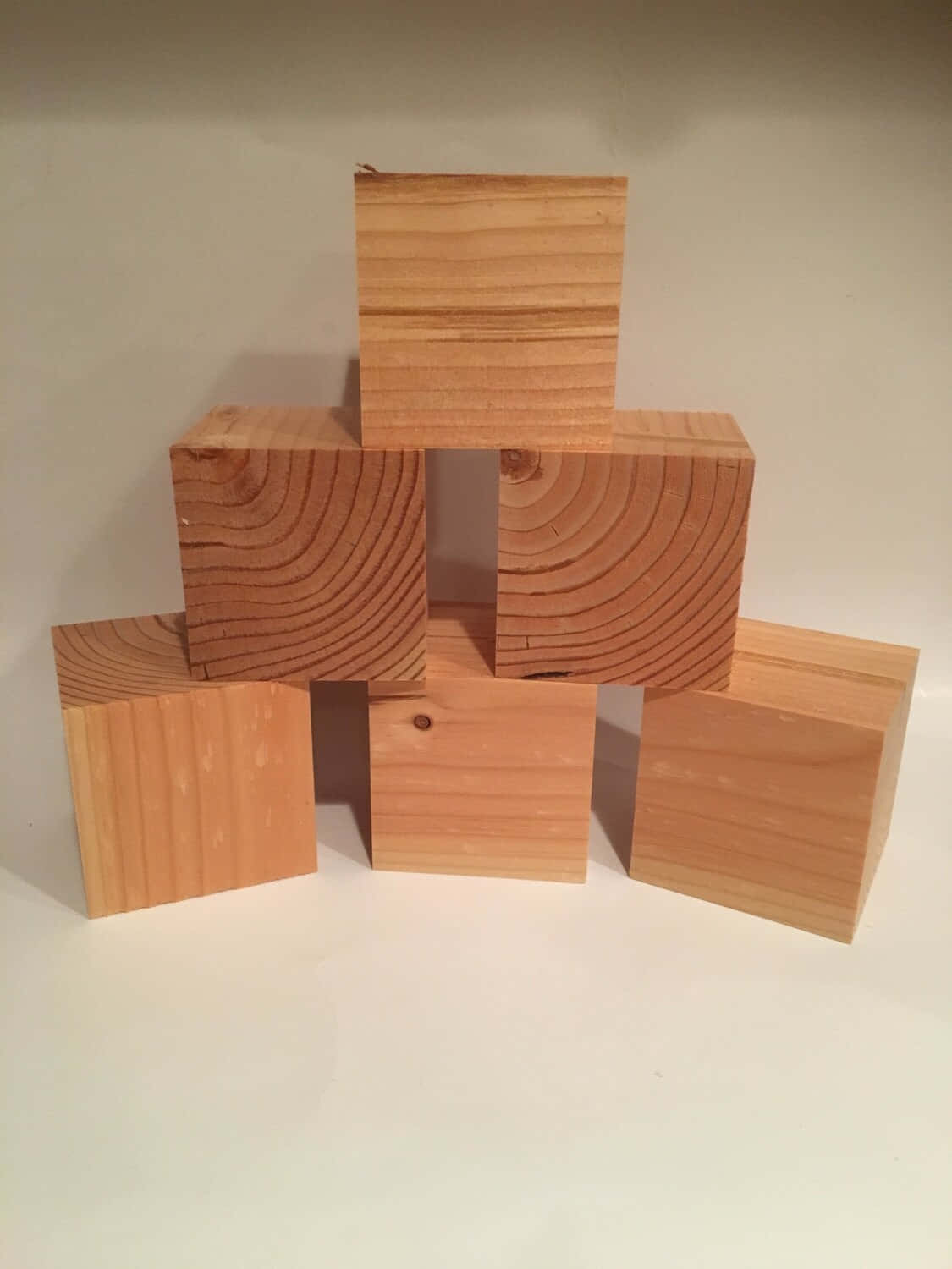 A Set Of Wooden Blocks With Different Designs