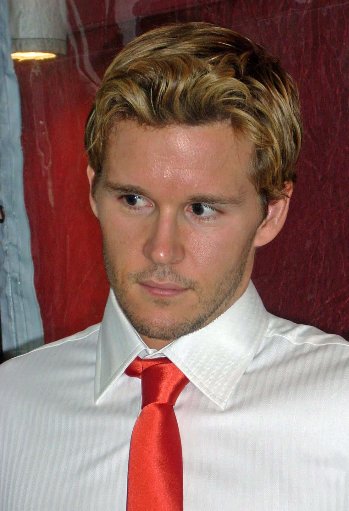 Blonde Manin White Shirtand Red Tie Wallpaper