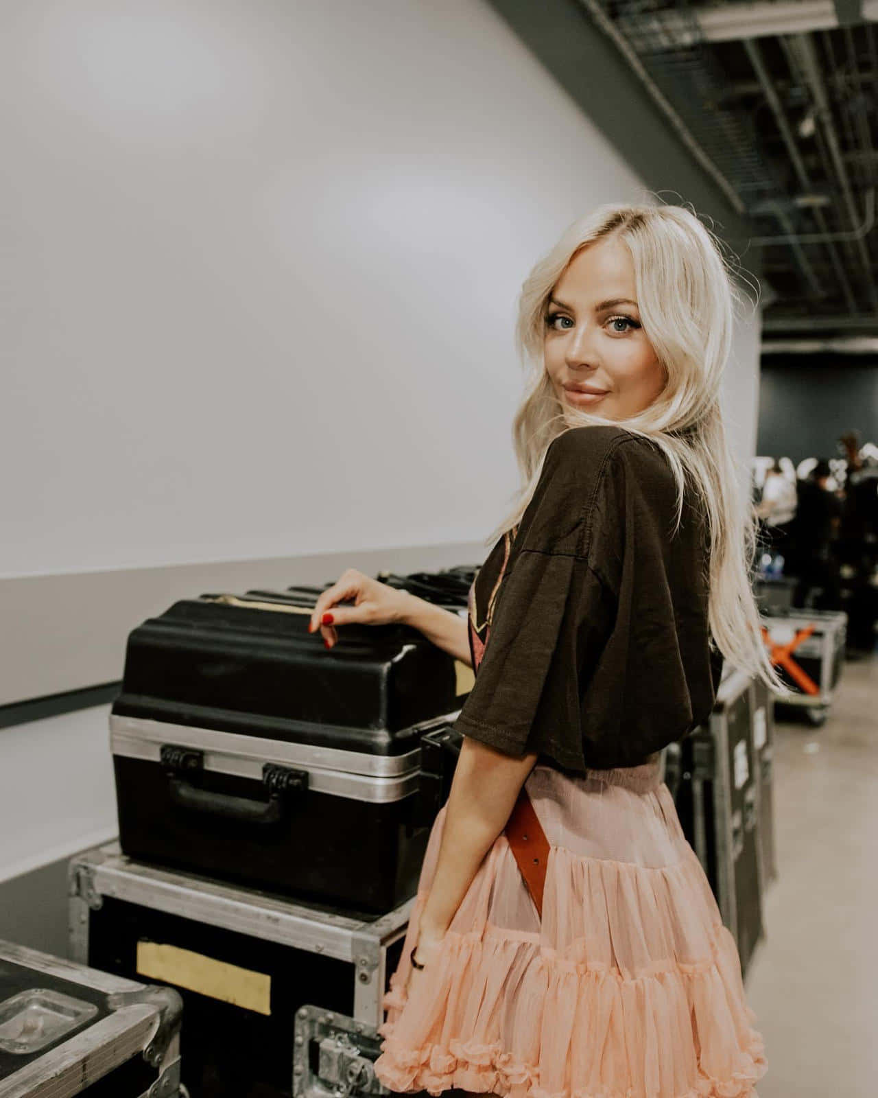 Blonde Woman Backstage With Equipment Wallpaper