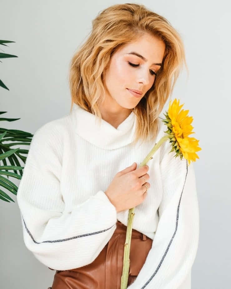 Blonde Woman Holding Sunflower Wallpaper