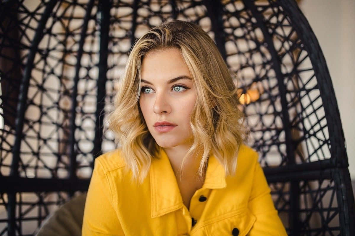 Blonde Womanin Yellow Jacket Wallpaper