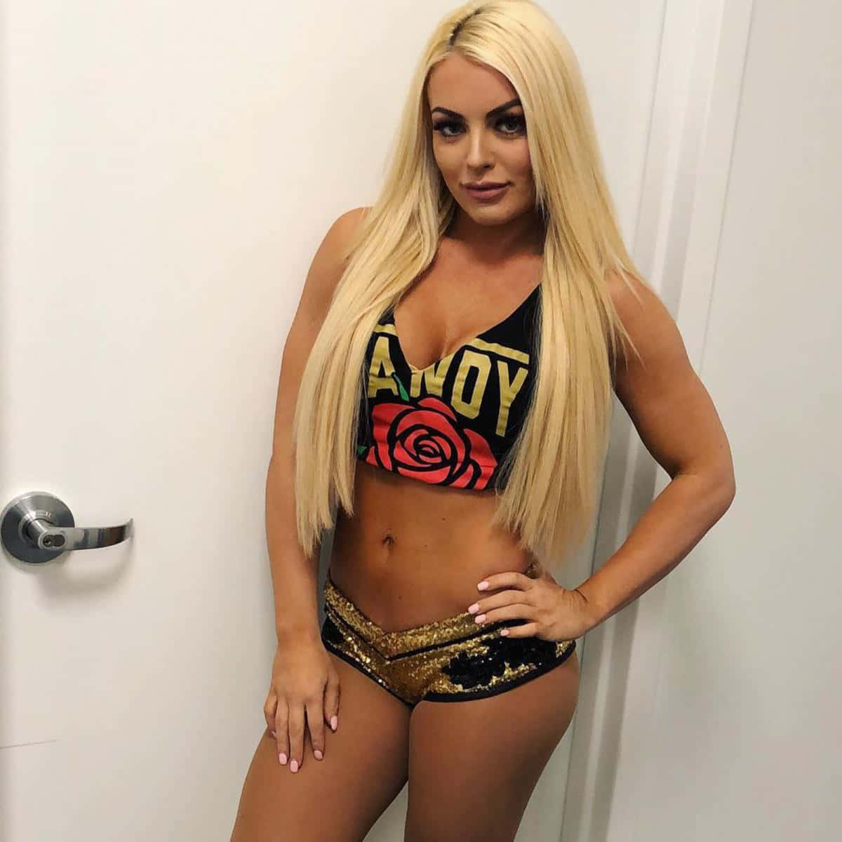 Blonde Wrestler Mandy Rose Posing Wallpaper