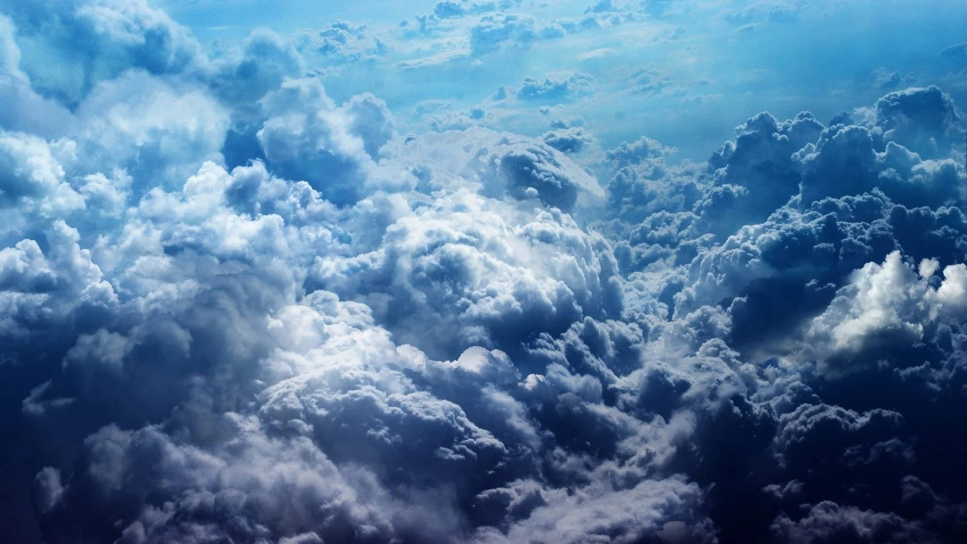Fondode Pantalla En Tonos Azules Con Motivos Estéticos De Nubes Para Escritorio. Fondo de pantalla