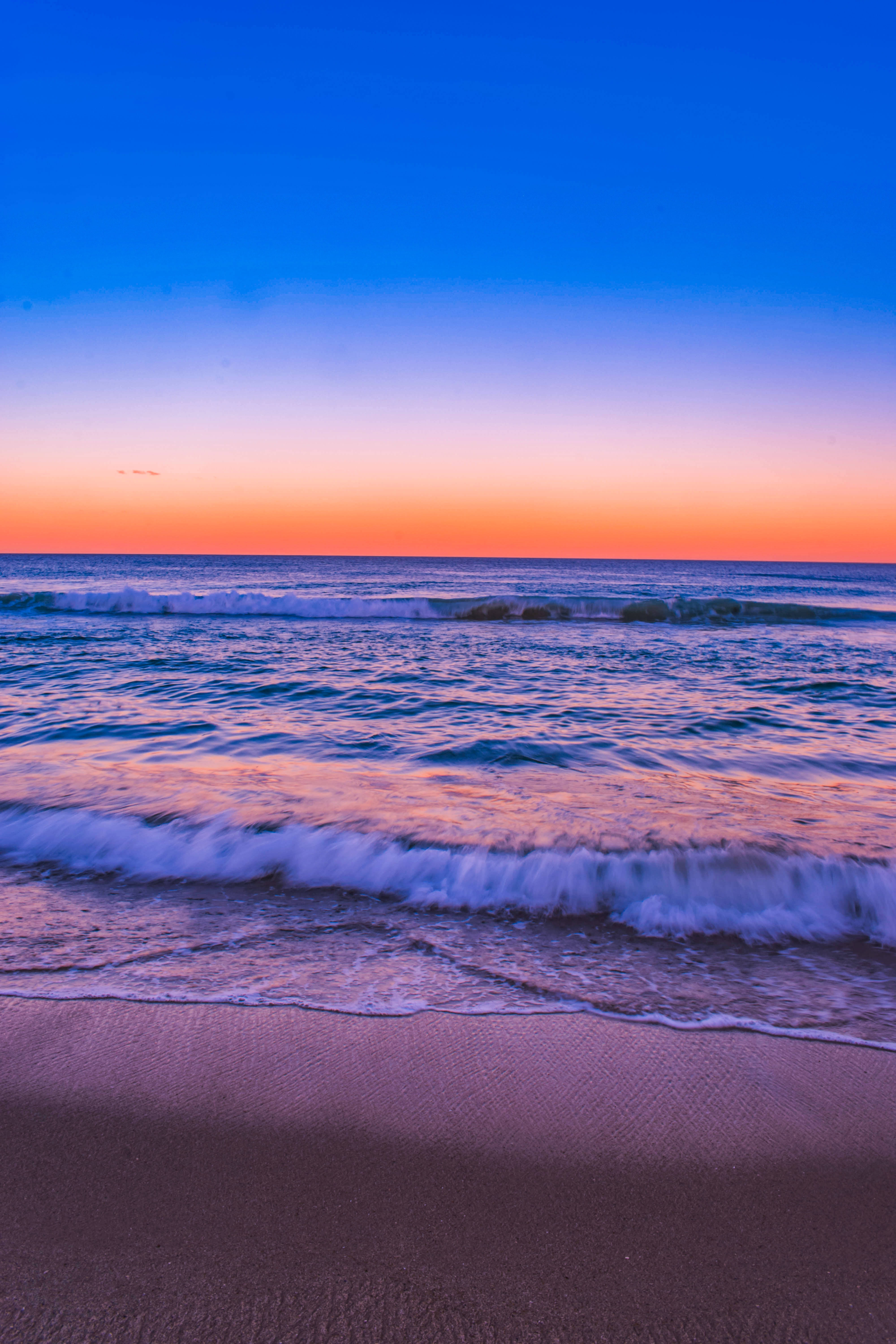 Blue And Orange Sunset Beach Android Wallpaper