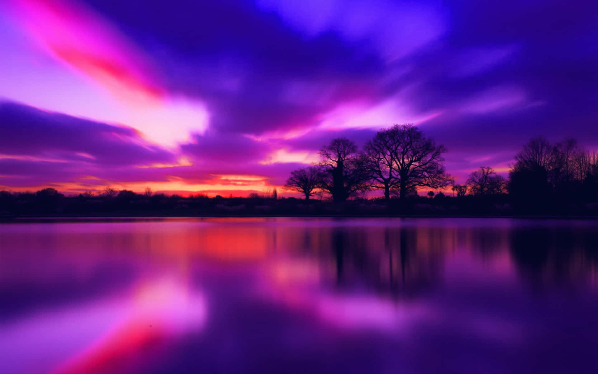 A tranquil sky filled with hues of blue and purple Wallpaper